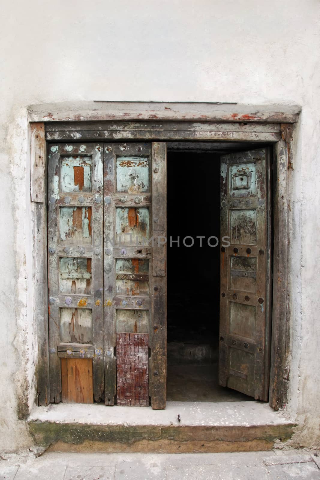 Old wooden door at Stone Town the capital of Zanzibar island East Africa.