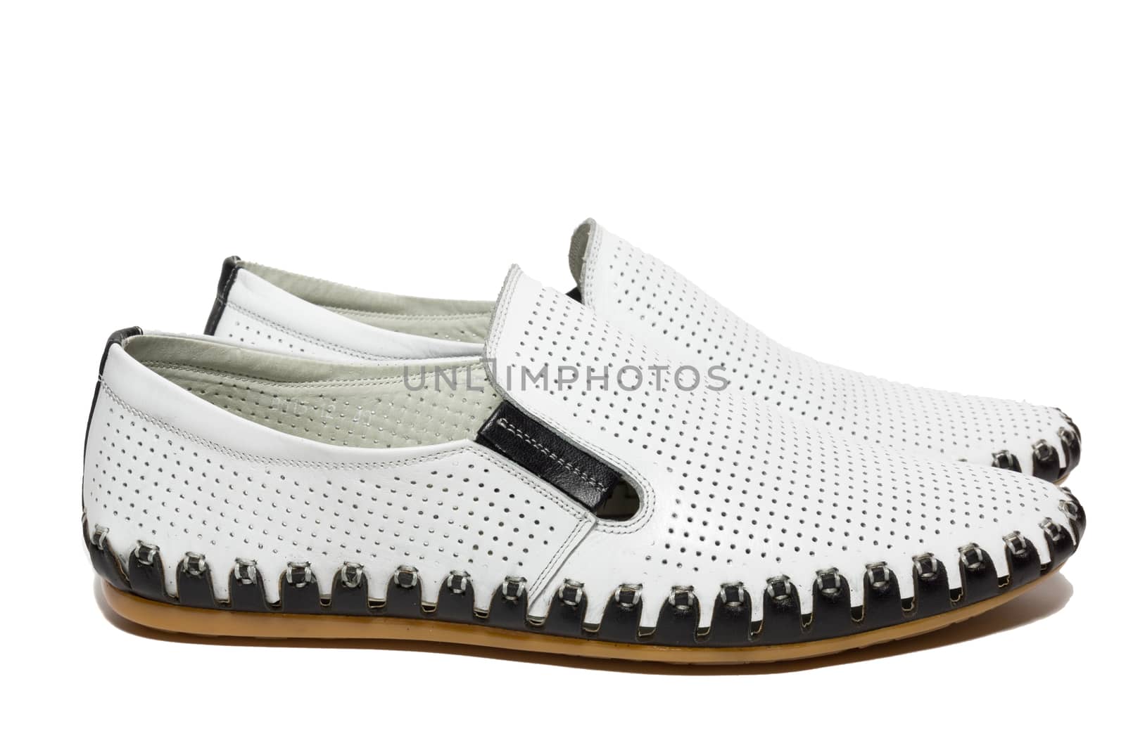 The photo shows the shoes on a white background