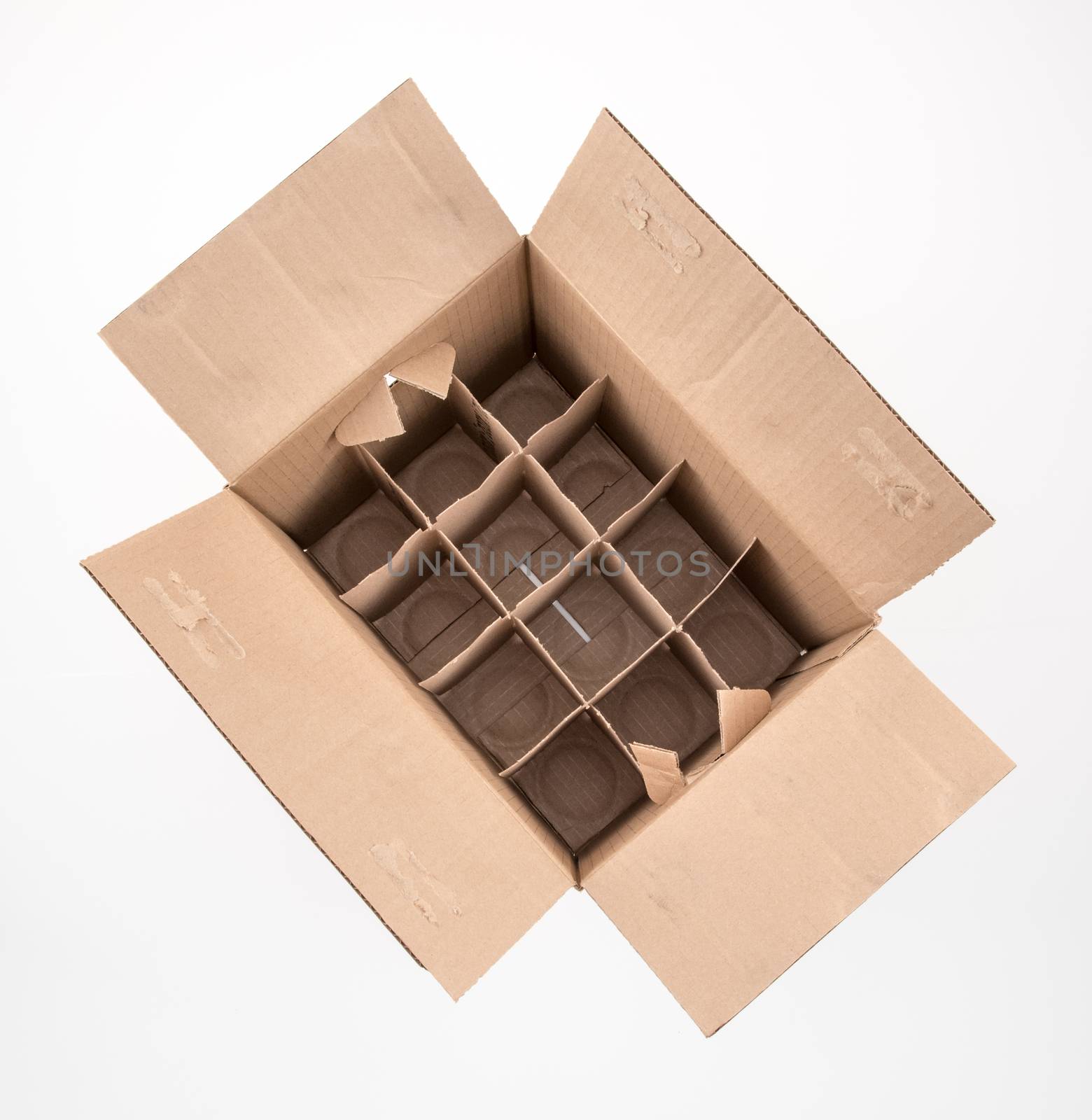 Overhead view of empty wine carton, on white background