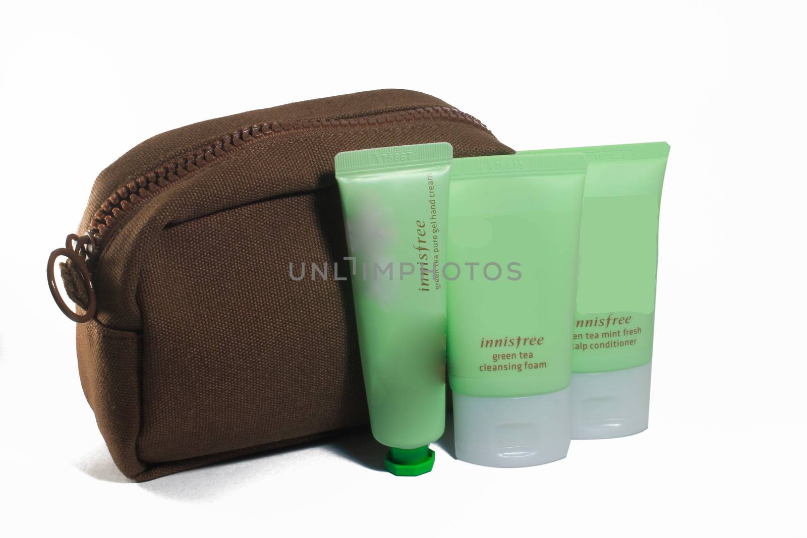 Brown Cosmetic Bag and Green consmetic Isolated