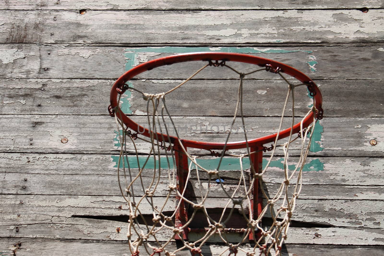 Basketball hoop in the school Thailand by worrayuth