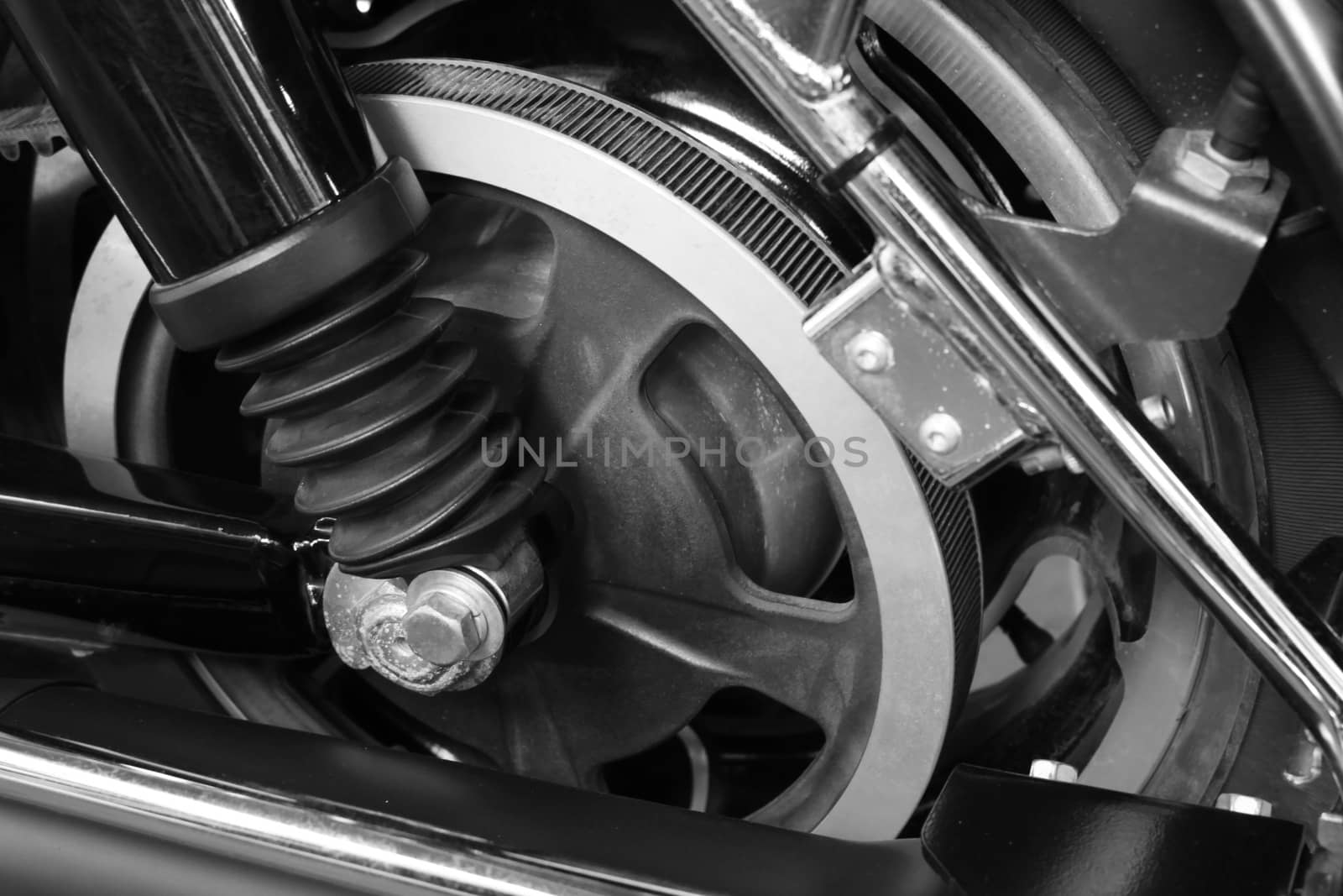 Close up belt drive wheel in the motorcycle black and white style by worrayuth