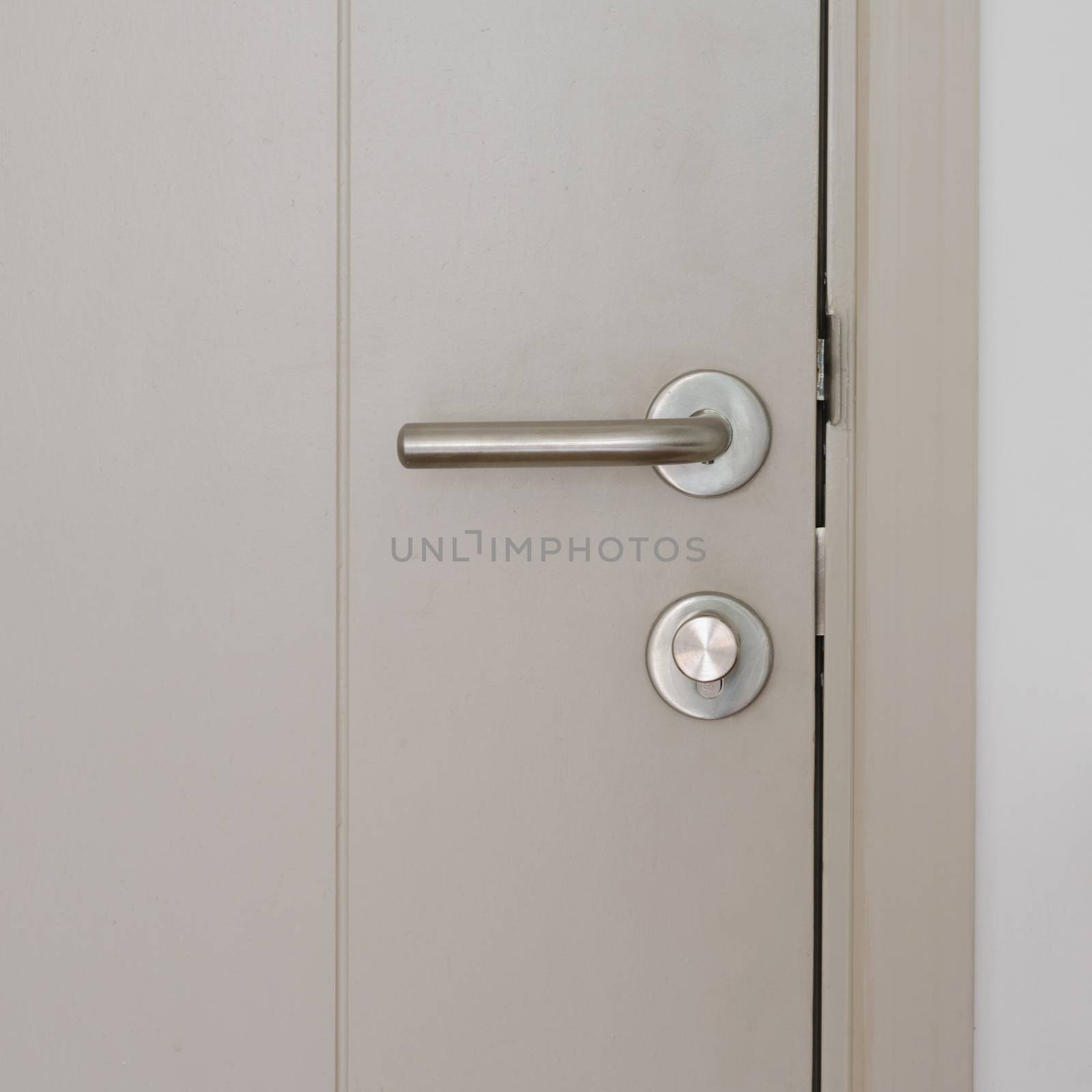 Modern style door handle on grey door