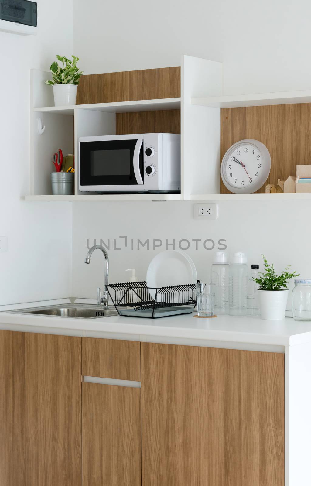 Modern pantry with utensil and sink by siraanamwong