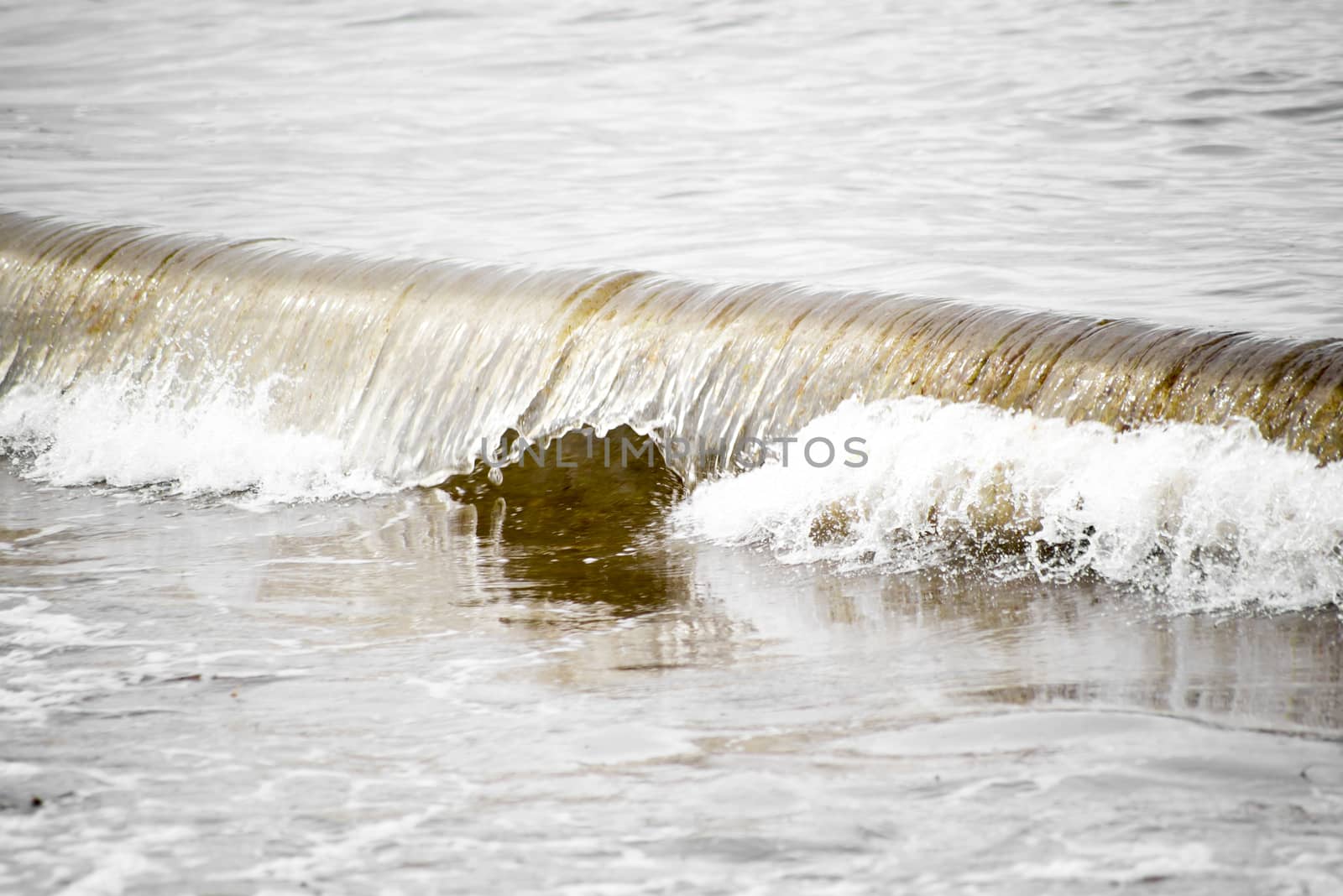crisp waves lashing onto ballybunion beach in county kerry ireland