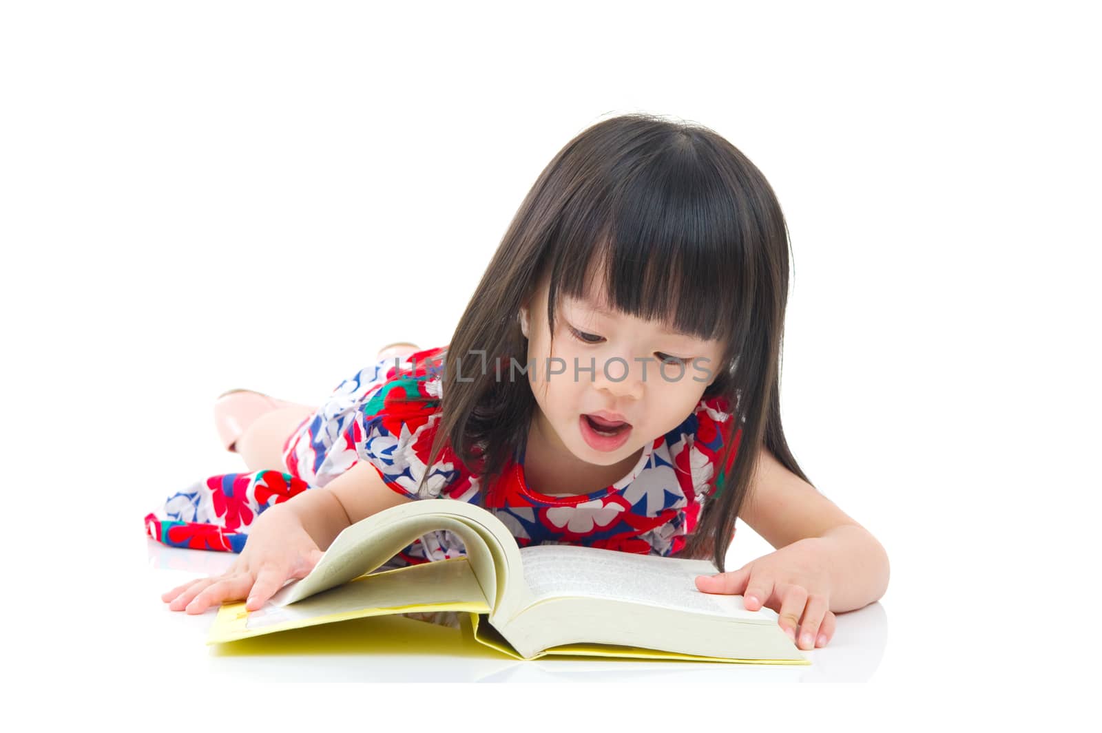 Asian girl reading a book
