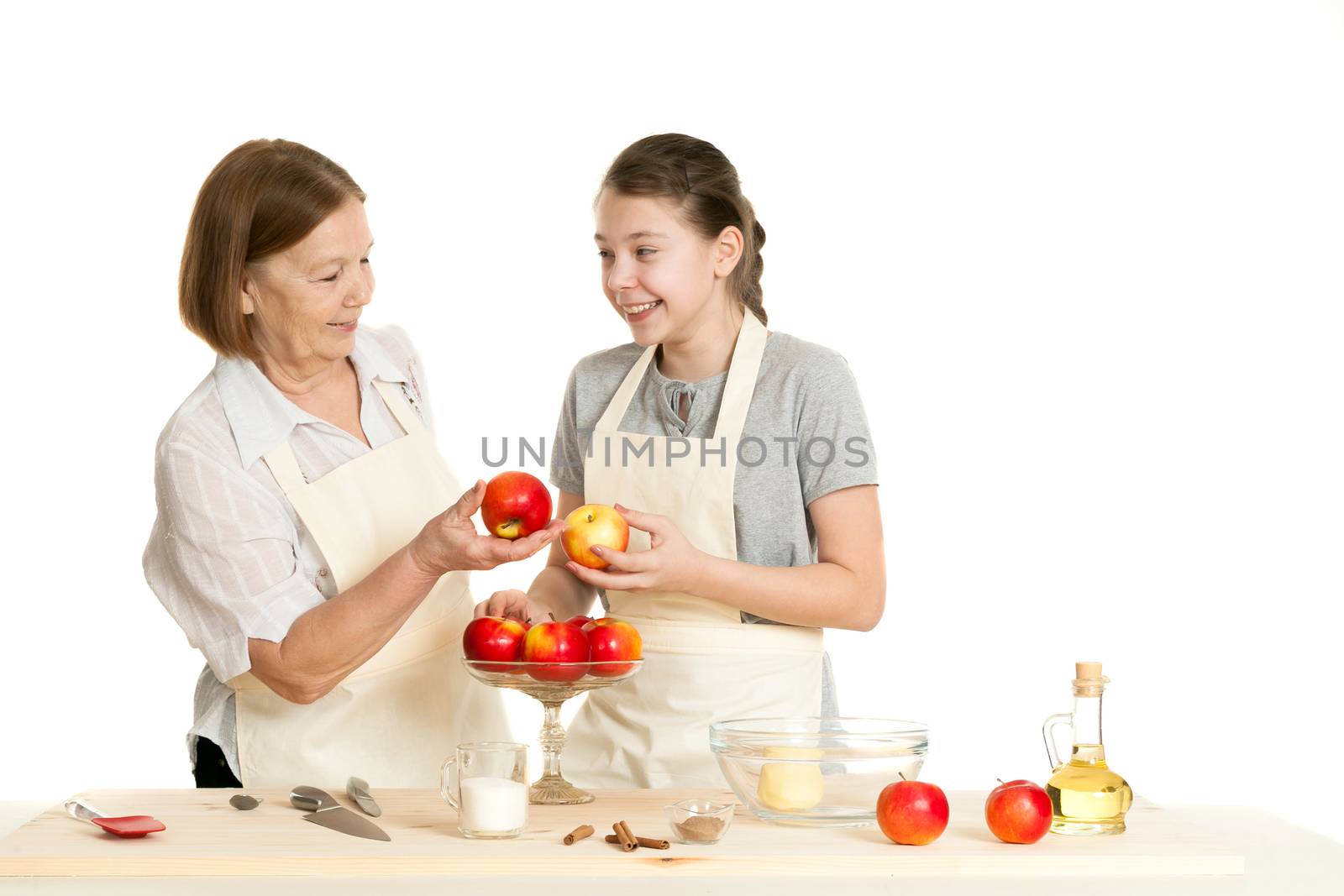the grandmother and the granddaughter choose apples by sveter