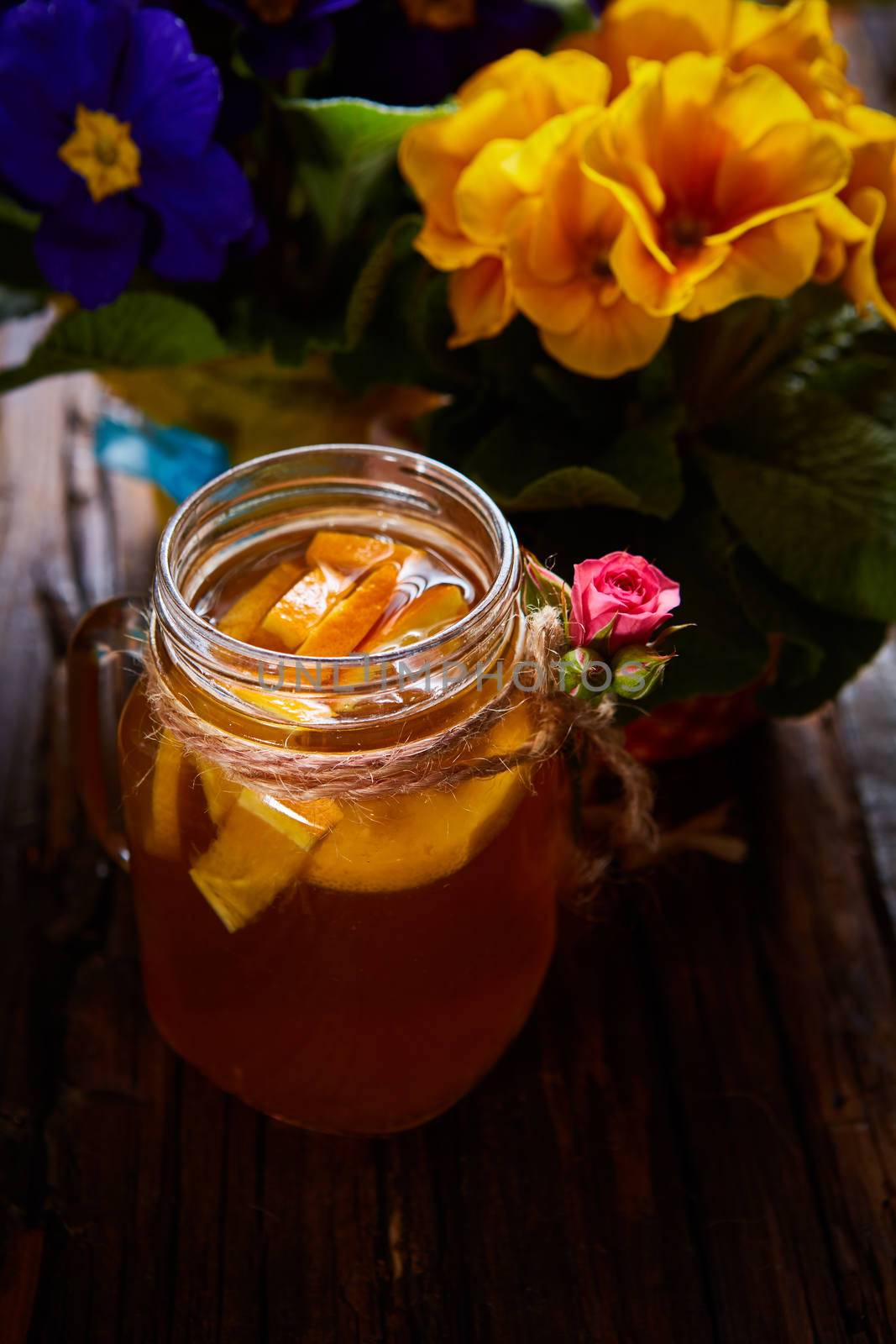 Ginger tea with orange, spices and honey. Shallow dof