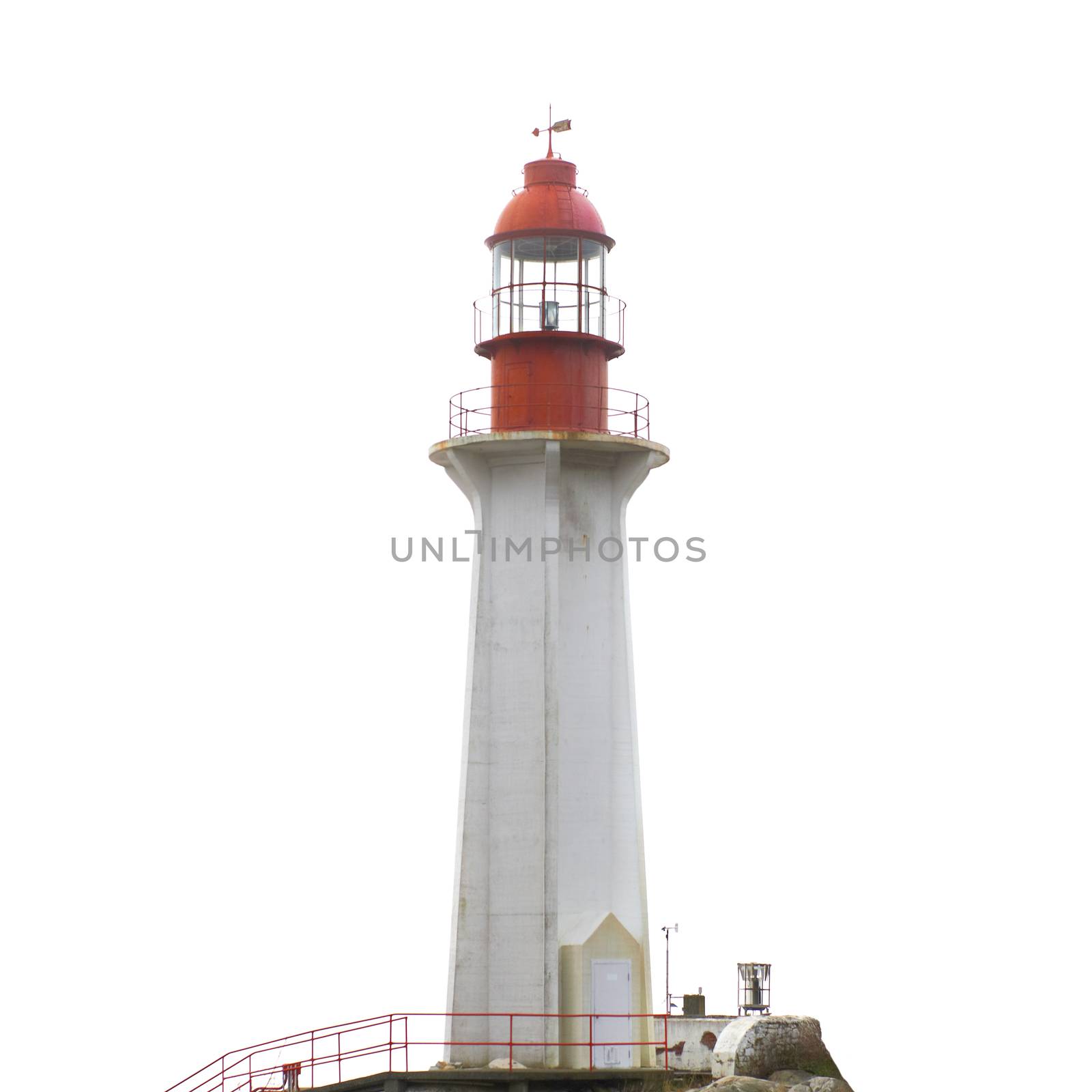 Lighthouse on the rock isolated on white