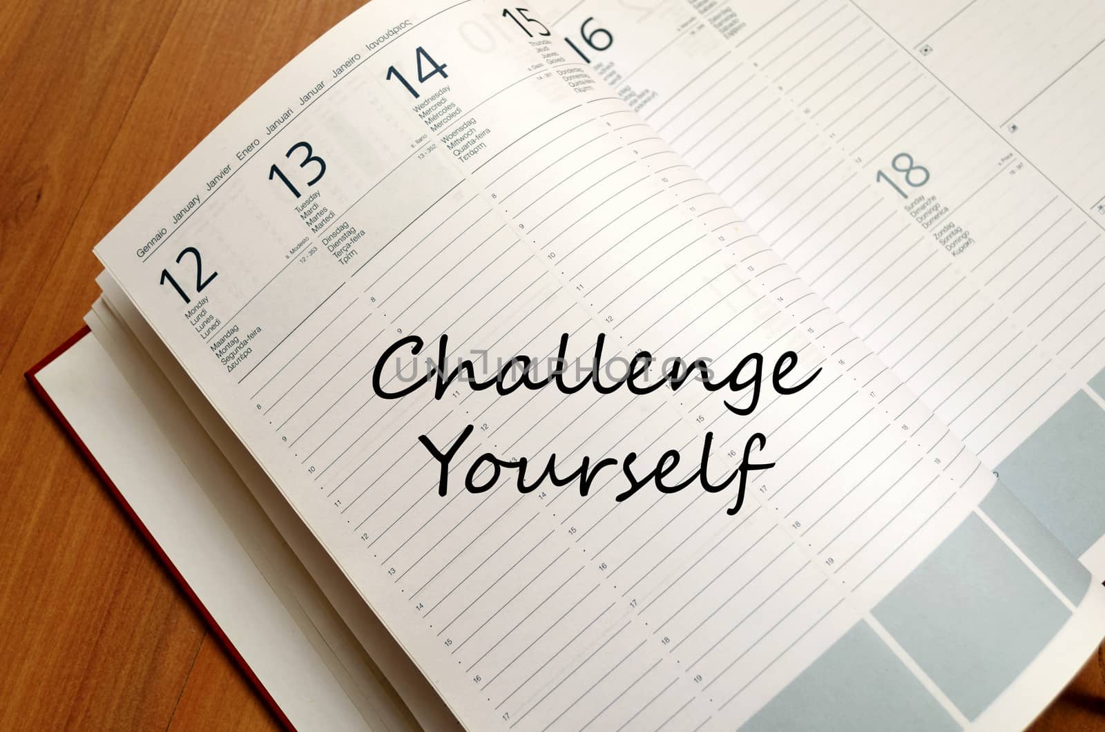 Challenge yourself text concept write on notebook