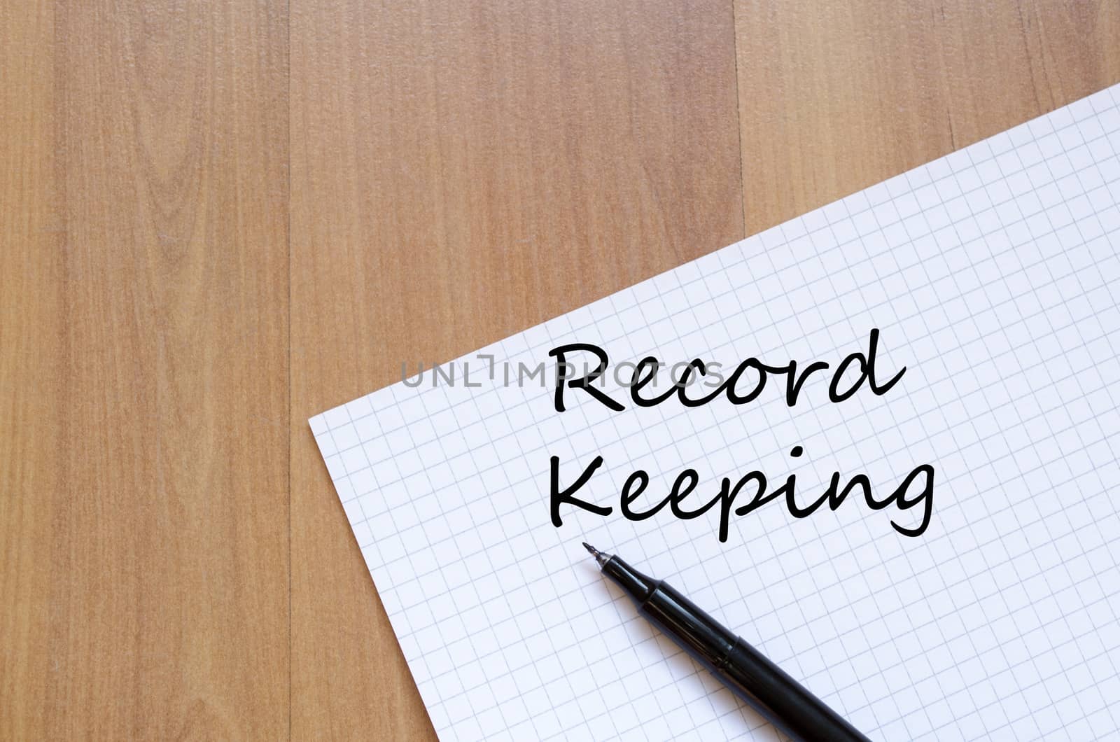 Record keeping text concept write on notebook with pen