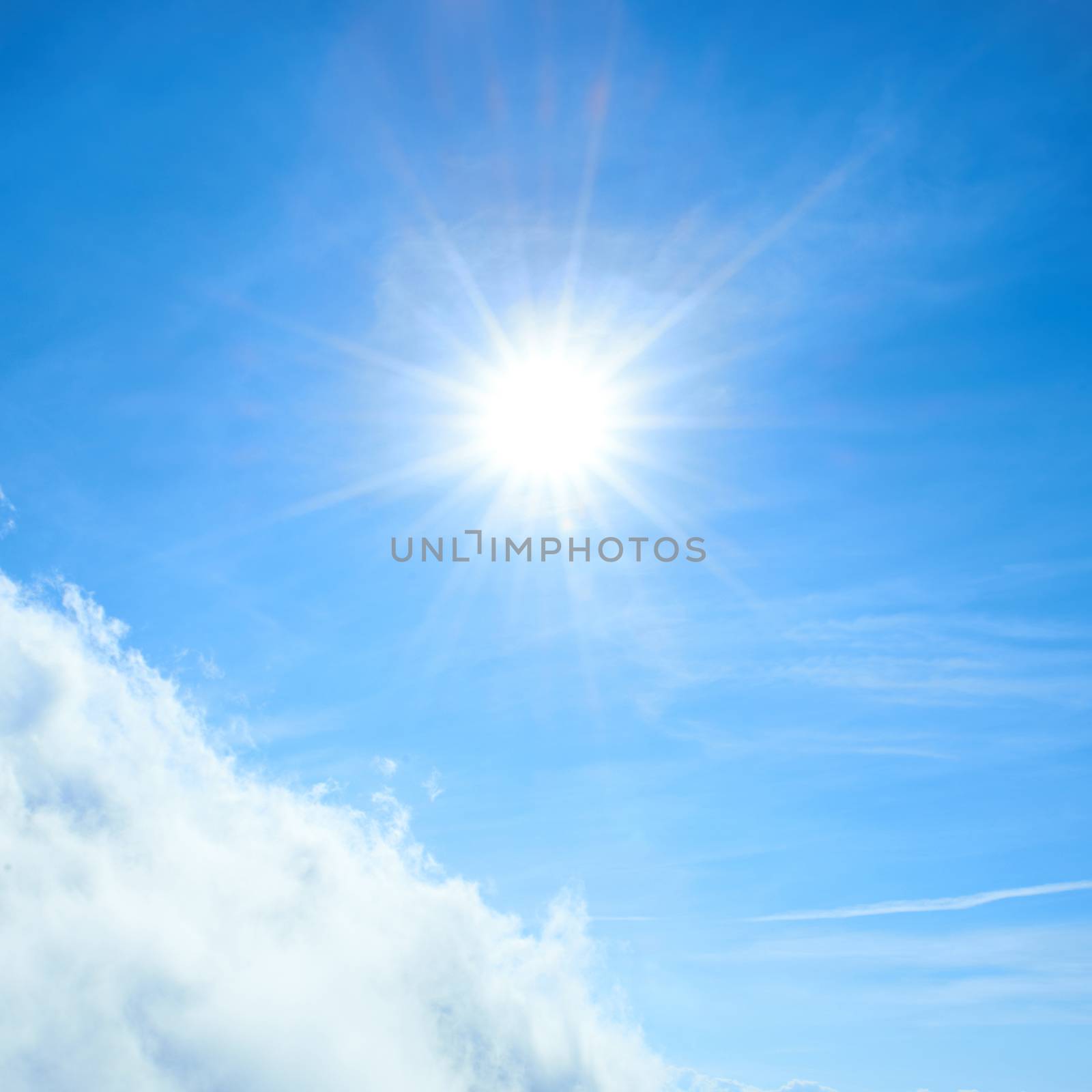 Beautiful blue sky with sun and clouds