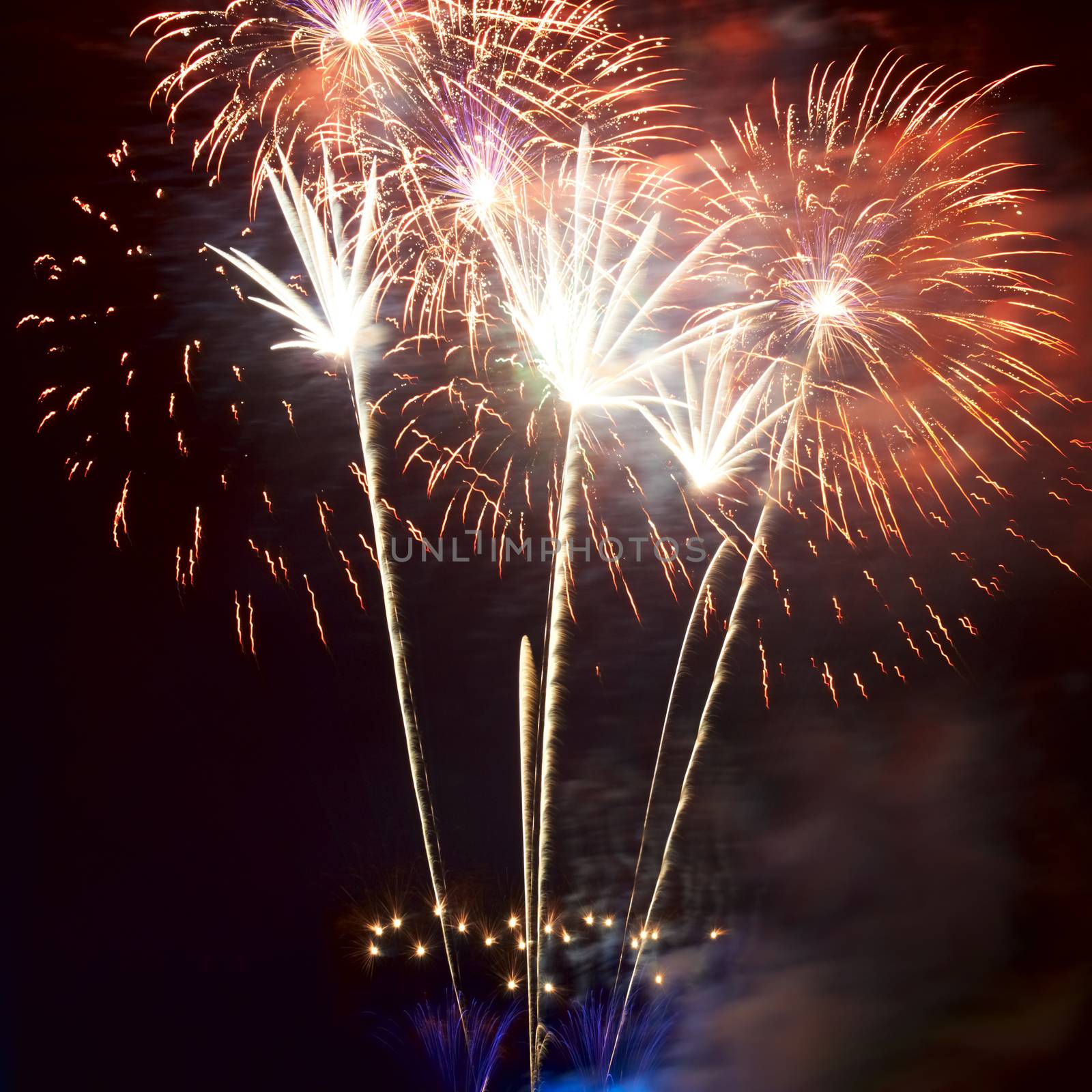 Red colorful fireworks on the black sky background