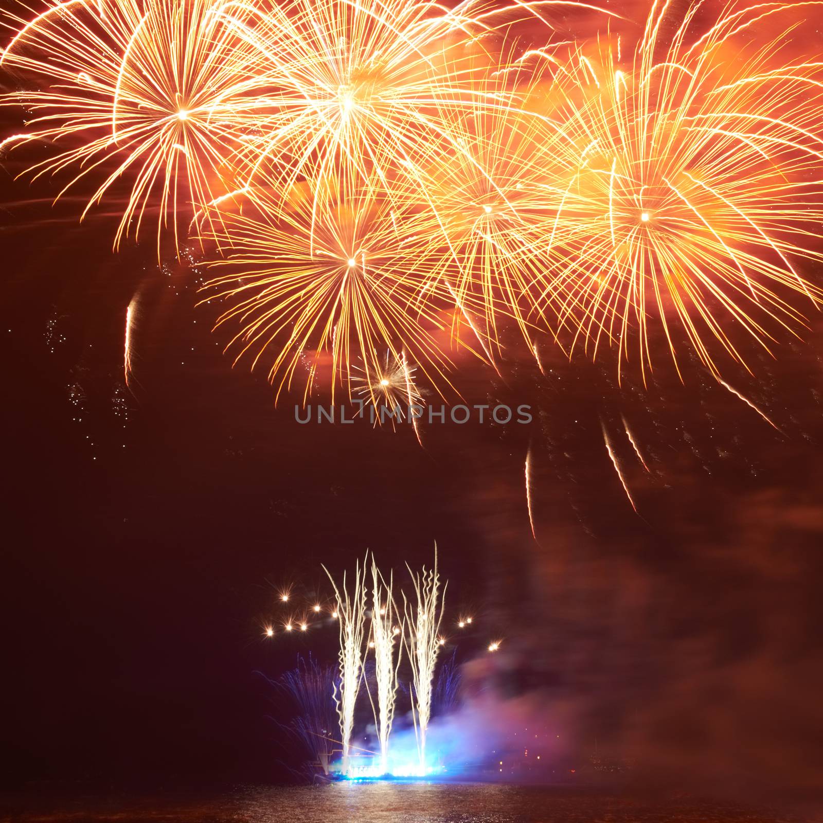 Red colorful fireworks on the black sky background