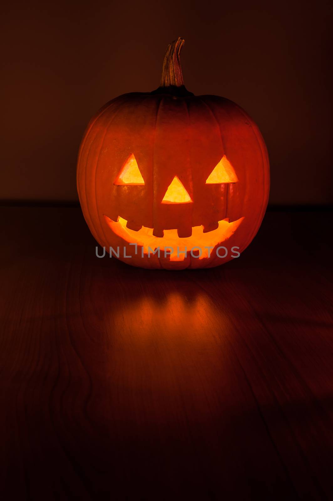 Halloween pumpkin glowing in the dark by mkos83