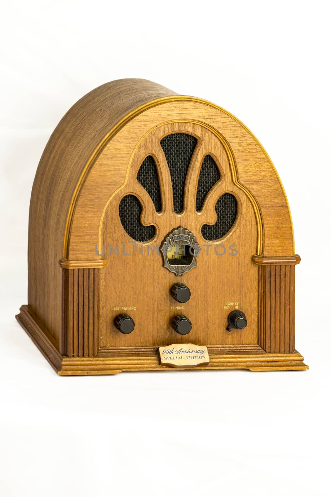 Vintage radio device over a white background