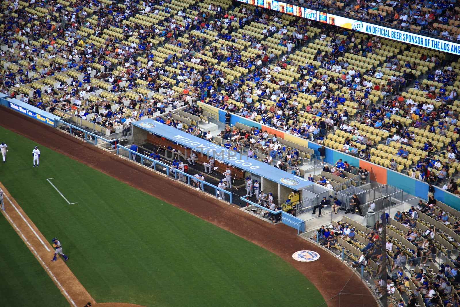 The New York Mets watching from the dugout at a baseball game at Dodger Stadium, home of the Los Angeles Dodgers