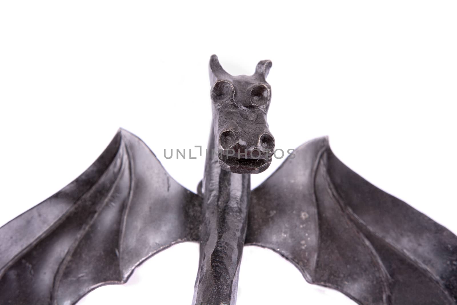 Forged dragon isolated on a white background
