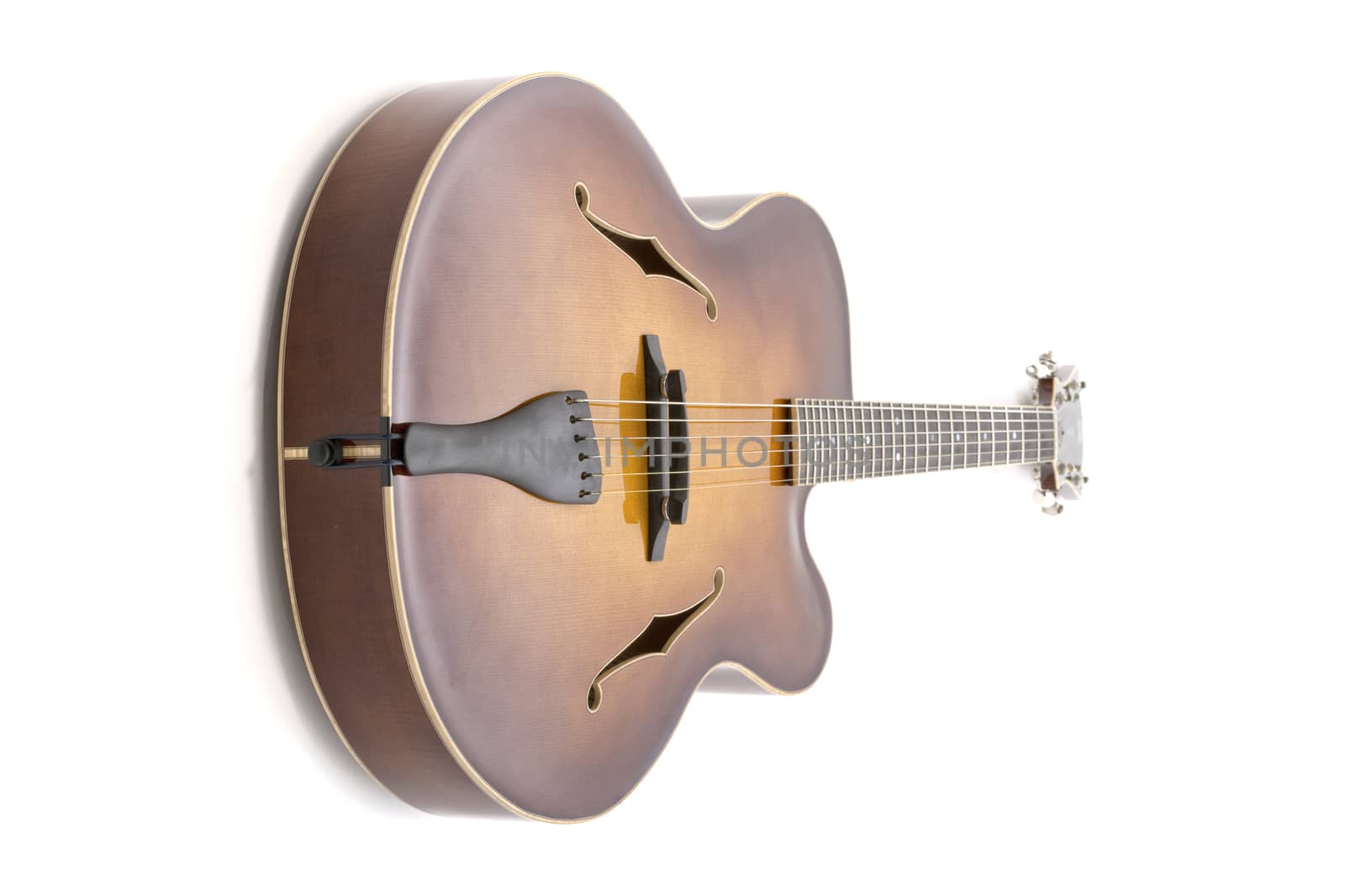Handmade  jazz guitar isolated on a white background