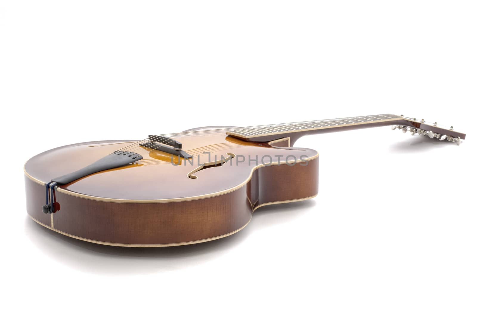 Handmade  jazz guitar isolated on a white background