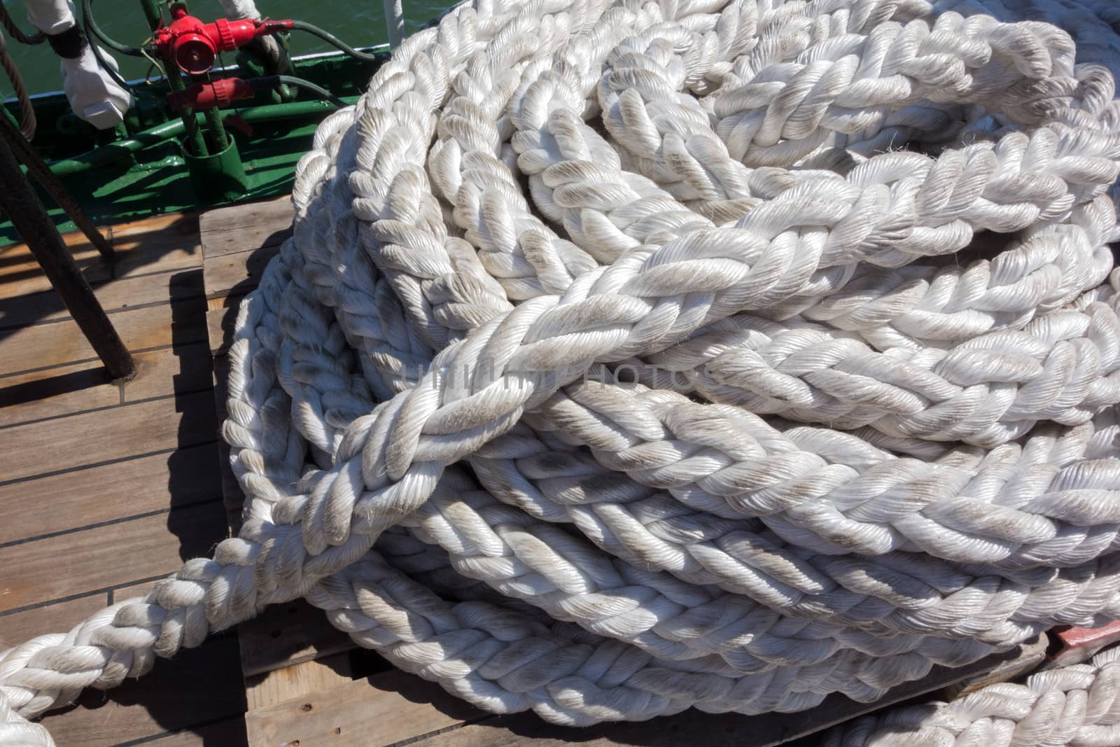 Thick rope on a wooden sailing ship floor