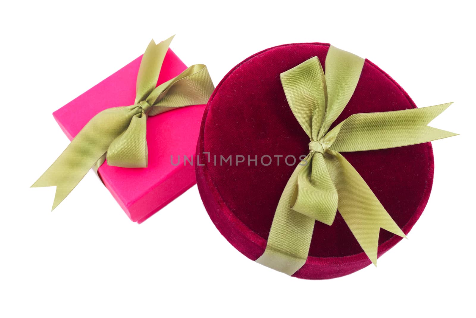 Gift boxes with satin ribbon and bow isolated over white background.