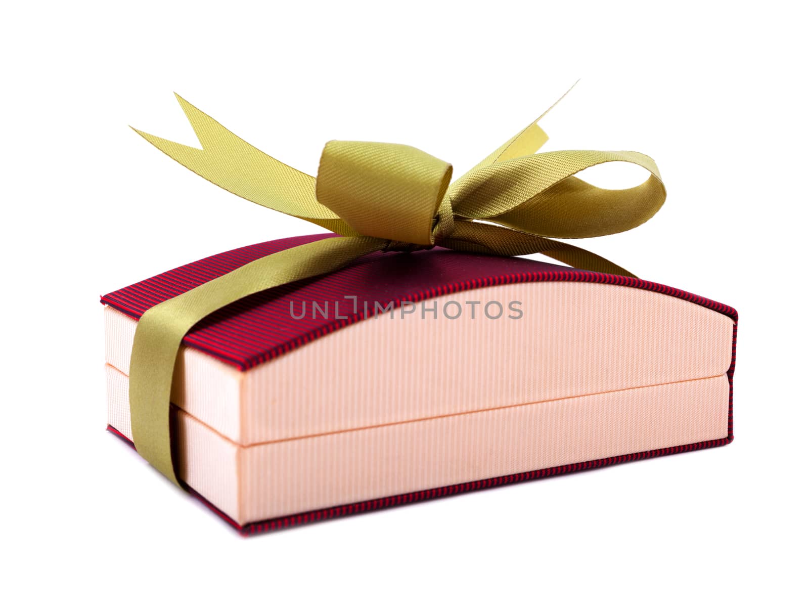 Luxury gift box in dark red shades with green satin ribbon and bow isolated over white background.