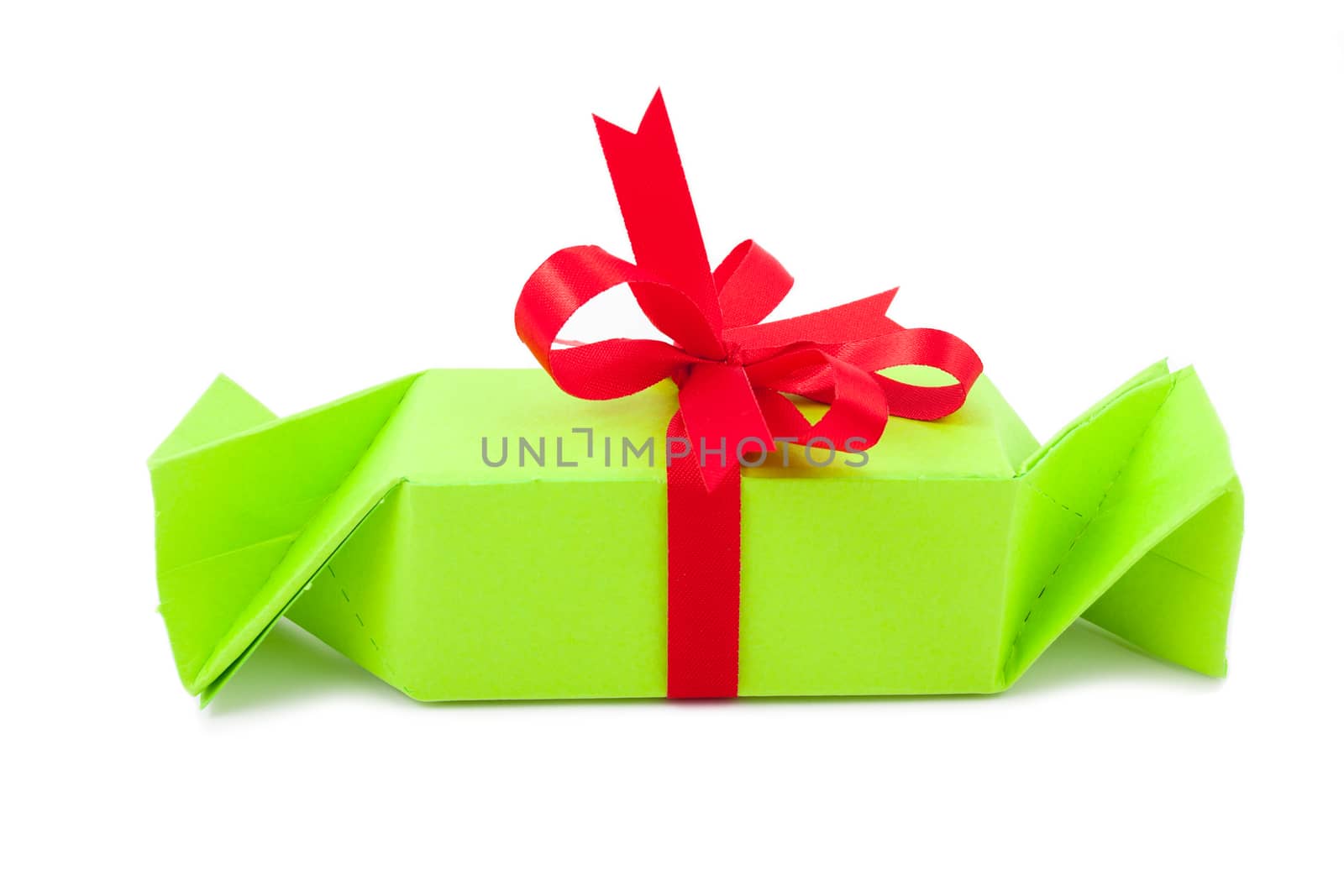 Luxury gift box with satin ribbon and bow isolated over white background.
