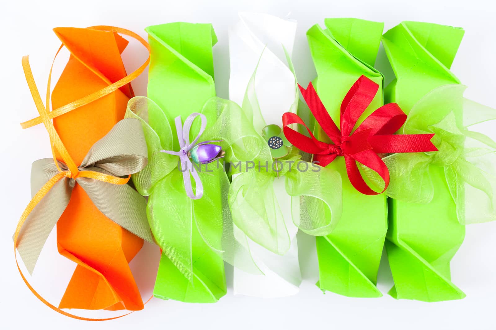 Gift box with bow on white background by Portokalis