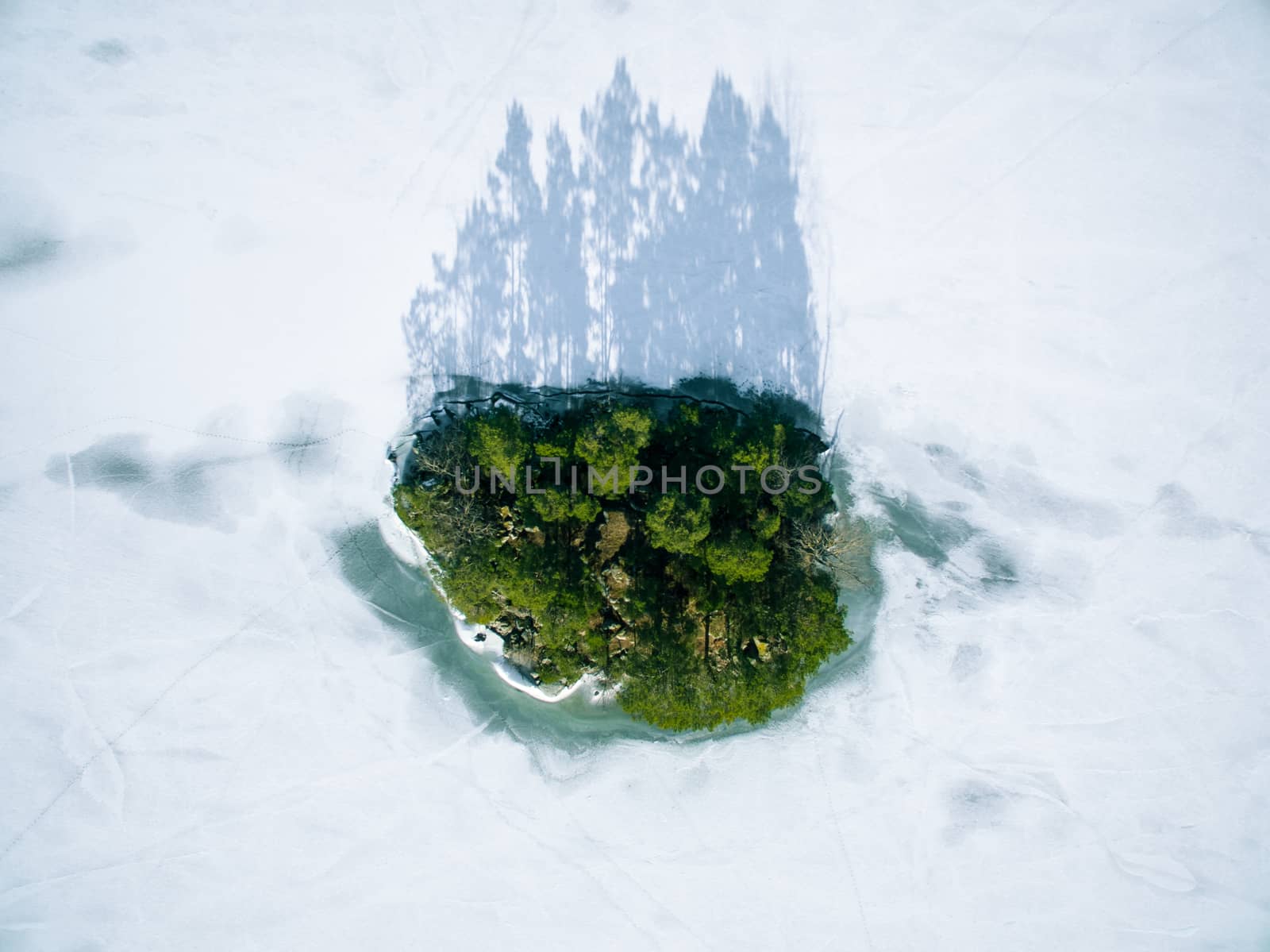 Small island with snow and ice in winter