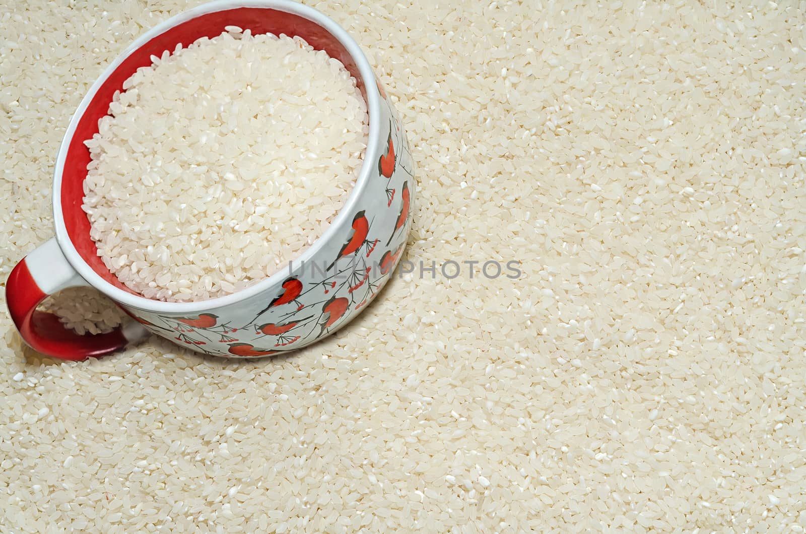 Textured background rice grains on the surface, and a Cup by Gaina