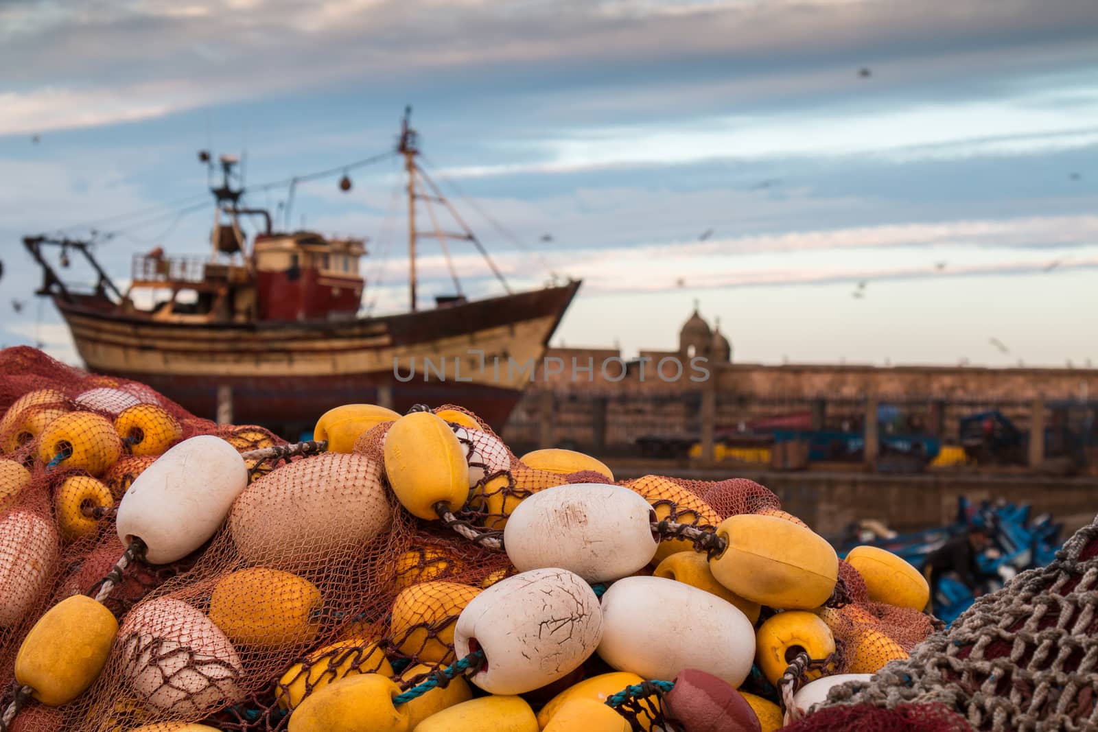 Fishing nets, boats and morning sky by YassminPhoto