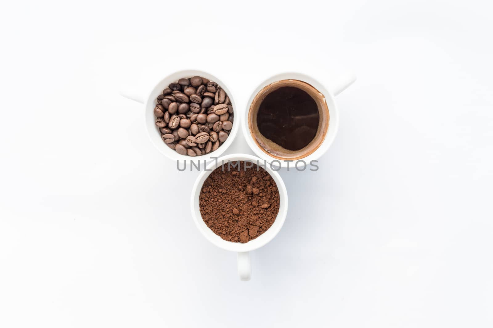 Three cups of different stages of preparing coffee by radzonimo