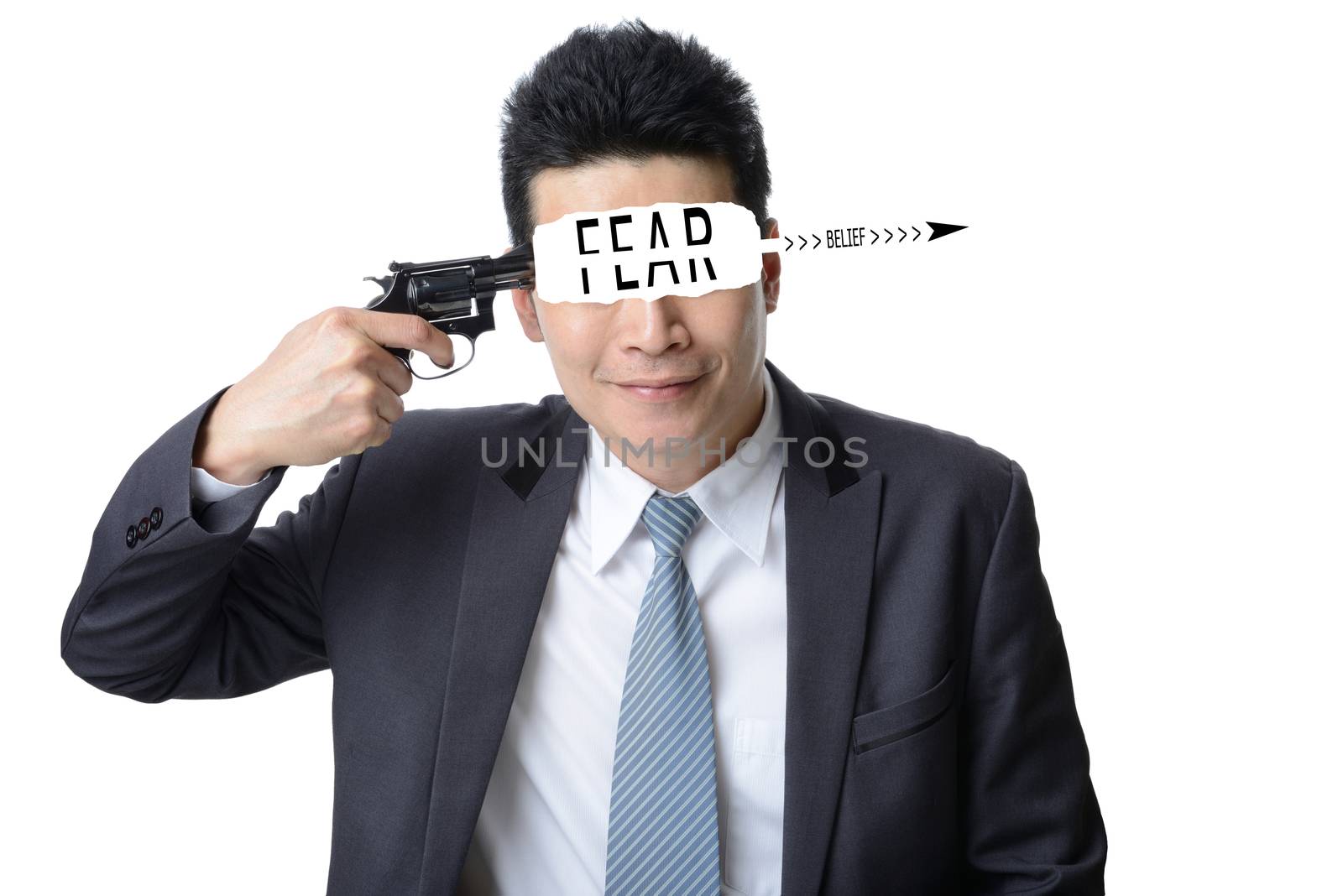 businessman use gun shoot word FEAR in his head isolated on whit by numskyman