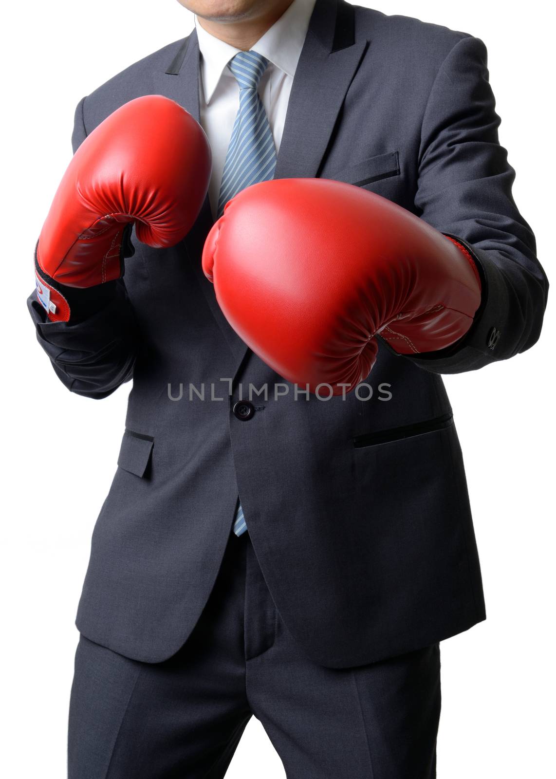 businessman with red boxing glove ready to fight with work, business concept