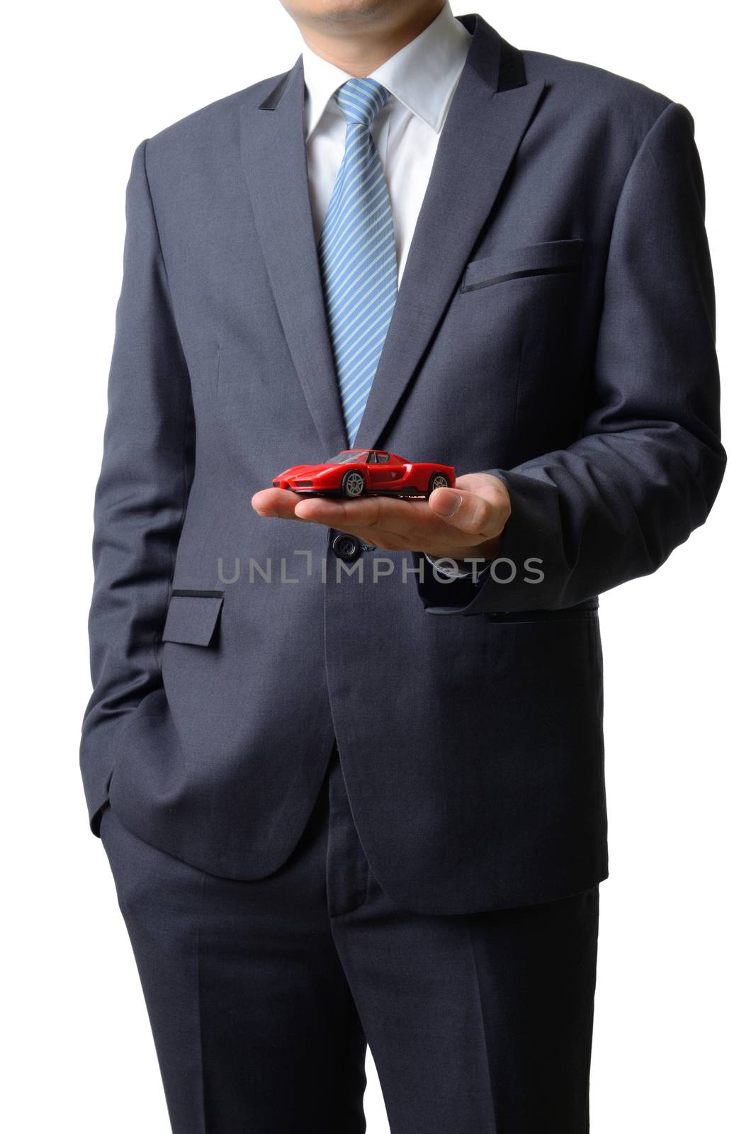 Businessman gives the model car to the customer isolated on white background, sale concept