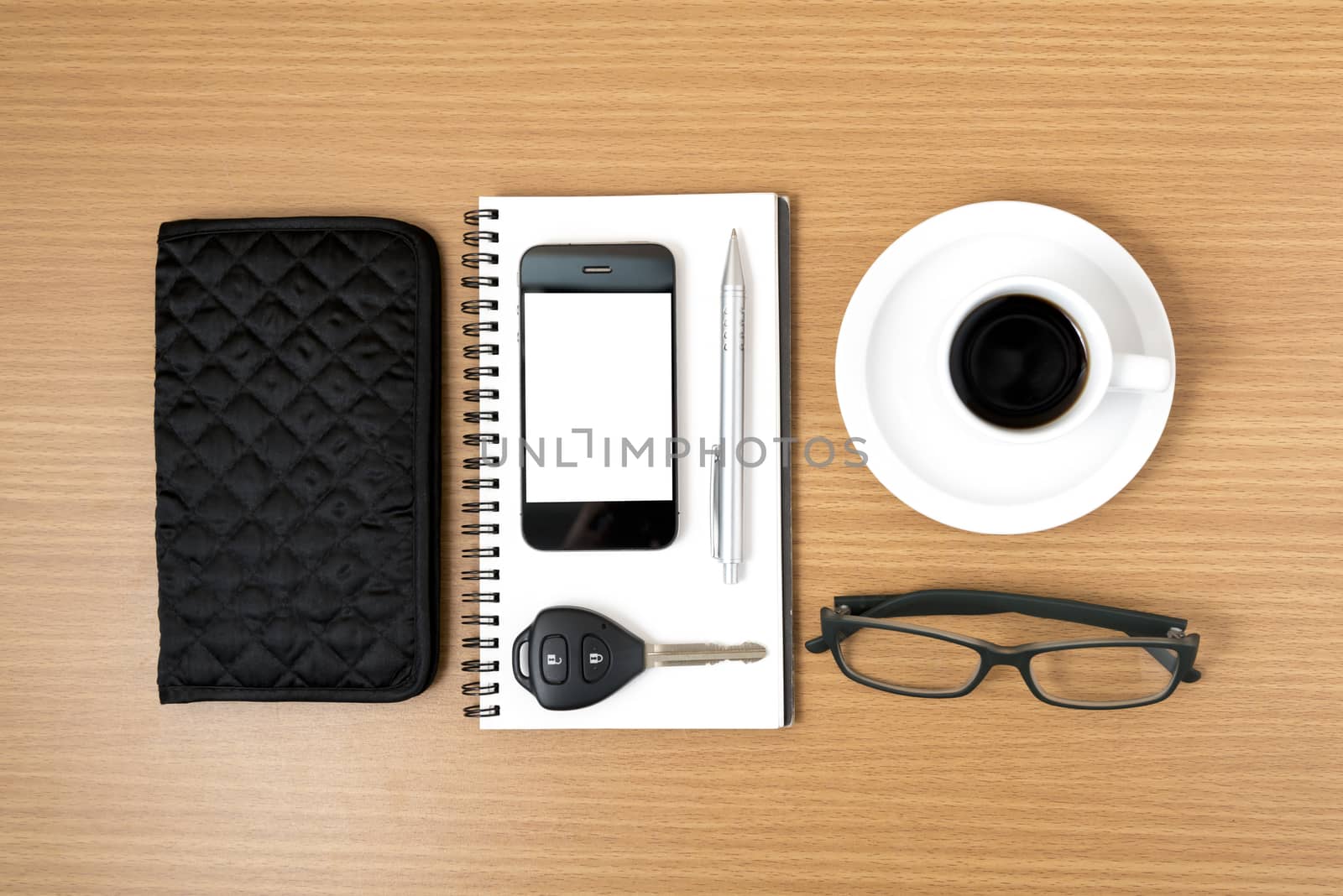 coffee and phone with notepad,car key,eyeglasses and wallet by ammza12