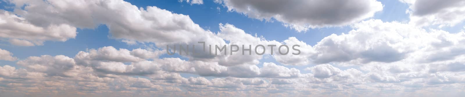 Blue sky, clouds and sun light panorama background