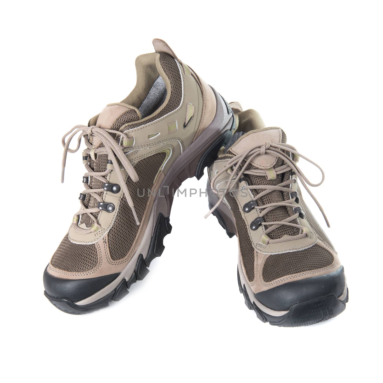 Pair of brown trainers by vapi