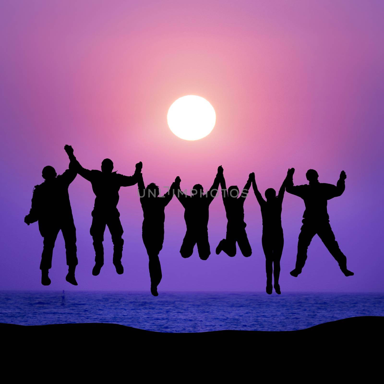 Group of friends jumping against sunset above the sea