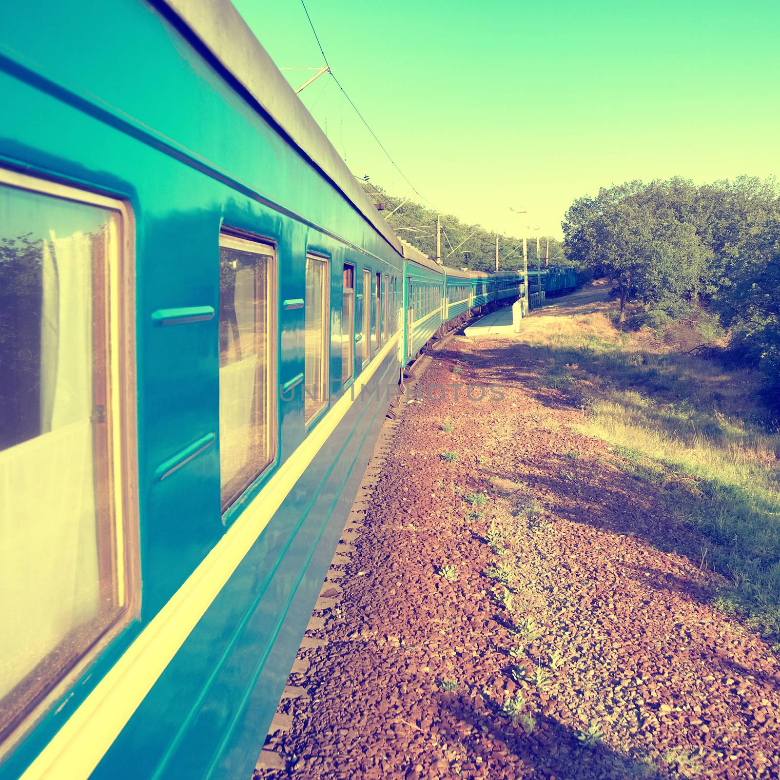 Motion train and blue wagon. Urban transportation. Modern colorization