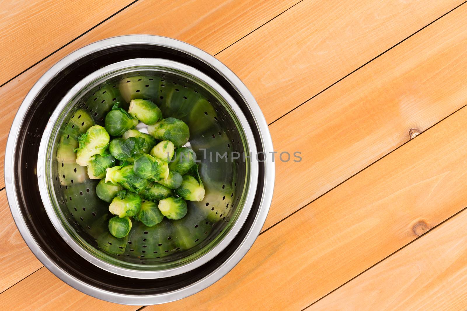 Freshly boiled leafy green brussels sprouts by coskun