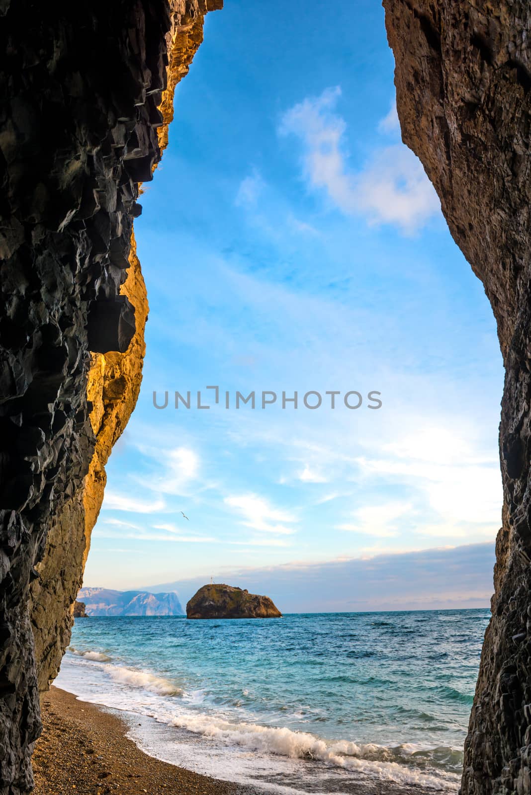 Tropical sea, rocks on the beach and blue sky with beautiful clouds