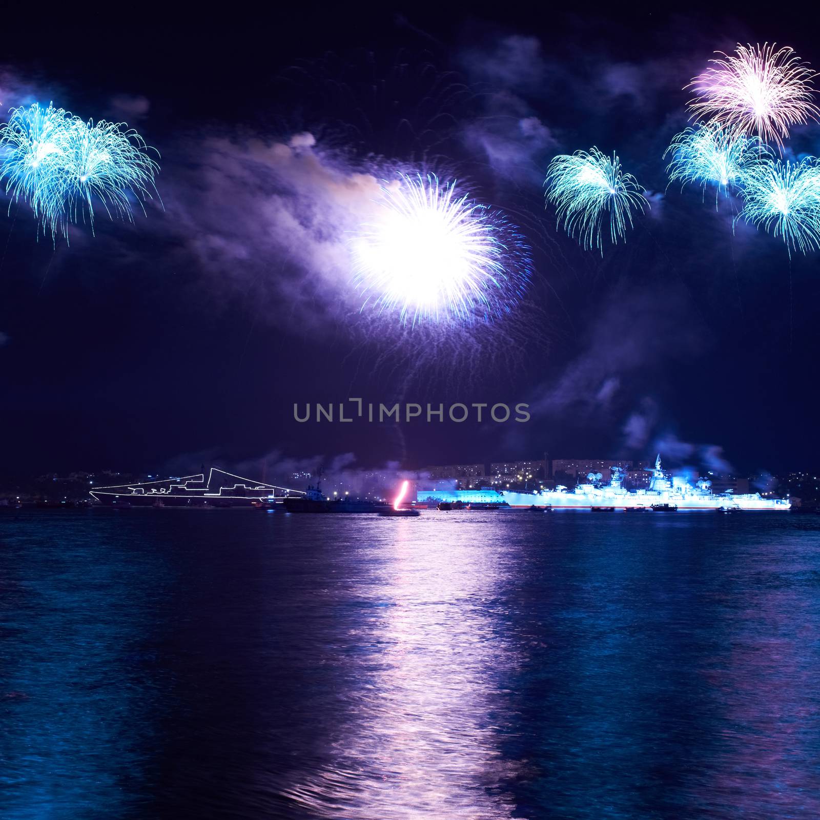 Blue colorful fireworks on the black sky background