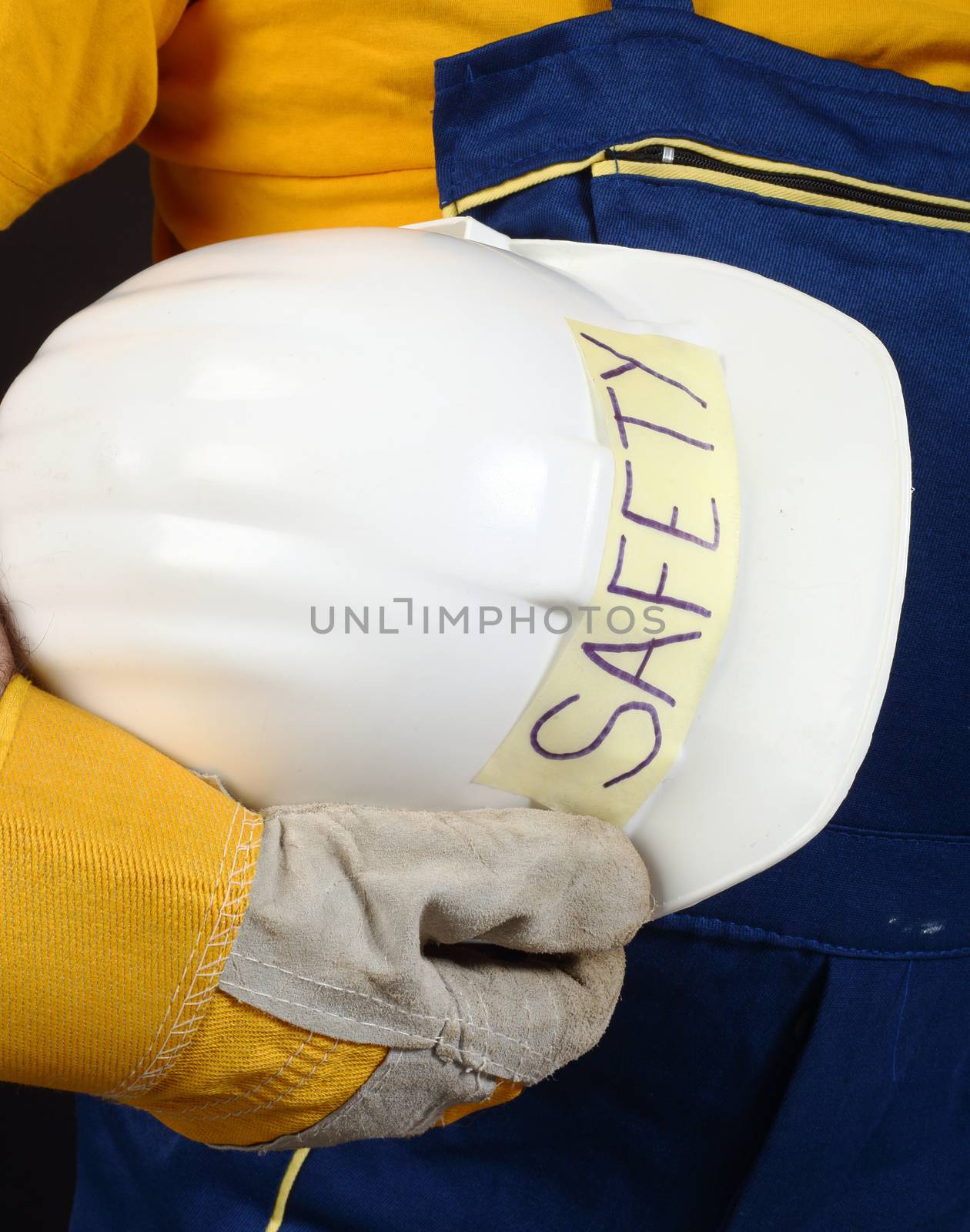 Man holding white helmet close up