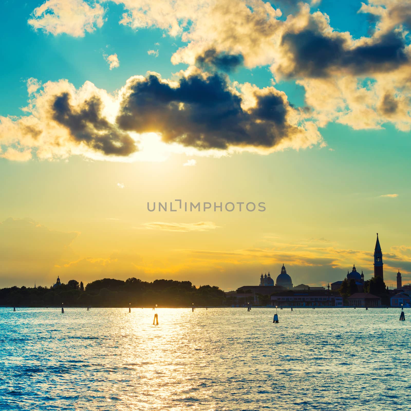 Sunset in Venice. View from the sea to Saint Mark square