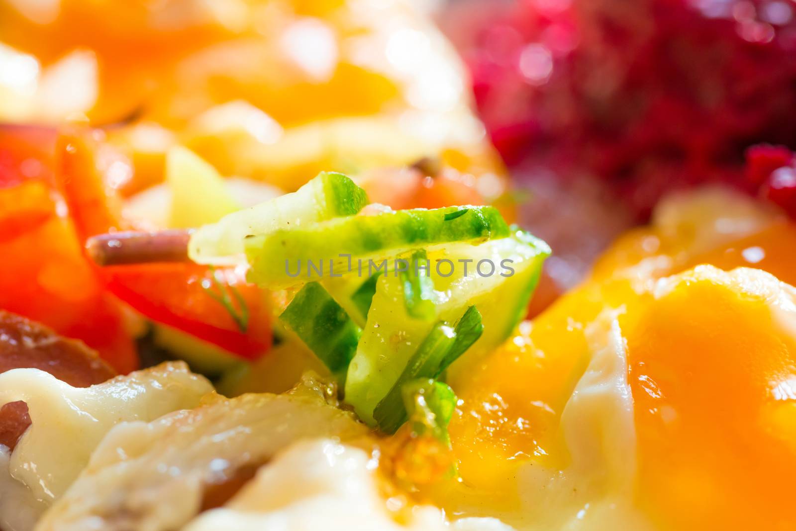 Fresh salad with tomato and fresh vegetable close up