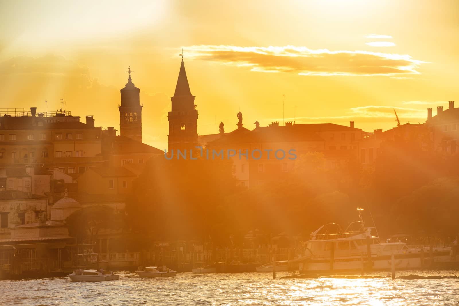 Sunset in Venice. View from the sea to Saint Mark square