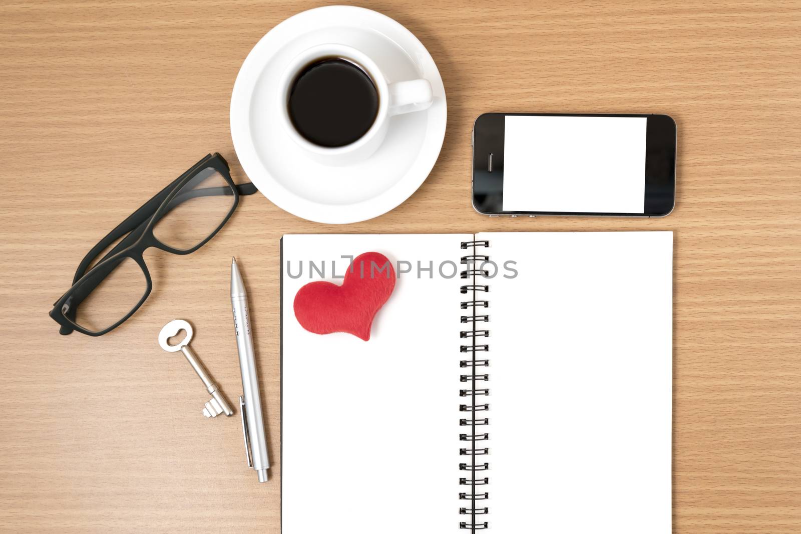office desk : coffee and phone with key,eyeglasses,notepad,heart by ammza12