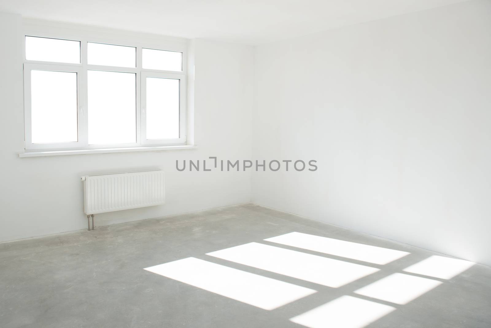 White room with window full of light